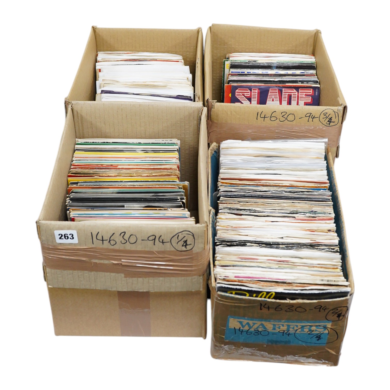 Four boxes of 7 inch singles, on record labels including; Columbia, Pye, Oriole, Stax, Top Rank, Parlophone, etc. artists include; Tom Jones, Otis Redding, The Seekers, Humphrey Lyttelton, Chris Barber, Chuck Berry, Clif